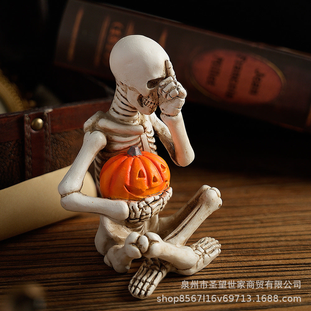 跨境创意万圣节骷髅头抱南瓜树脂桌面玄关密室派对节日氛围道具品